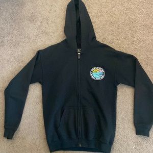 Santa Cruz O’Neill youth zip-up fleece jacket with sunset design.